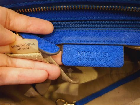 michael kors bag real vs fake|Michael Kors serial number checker.